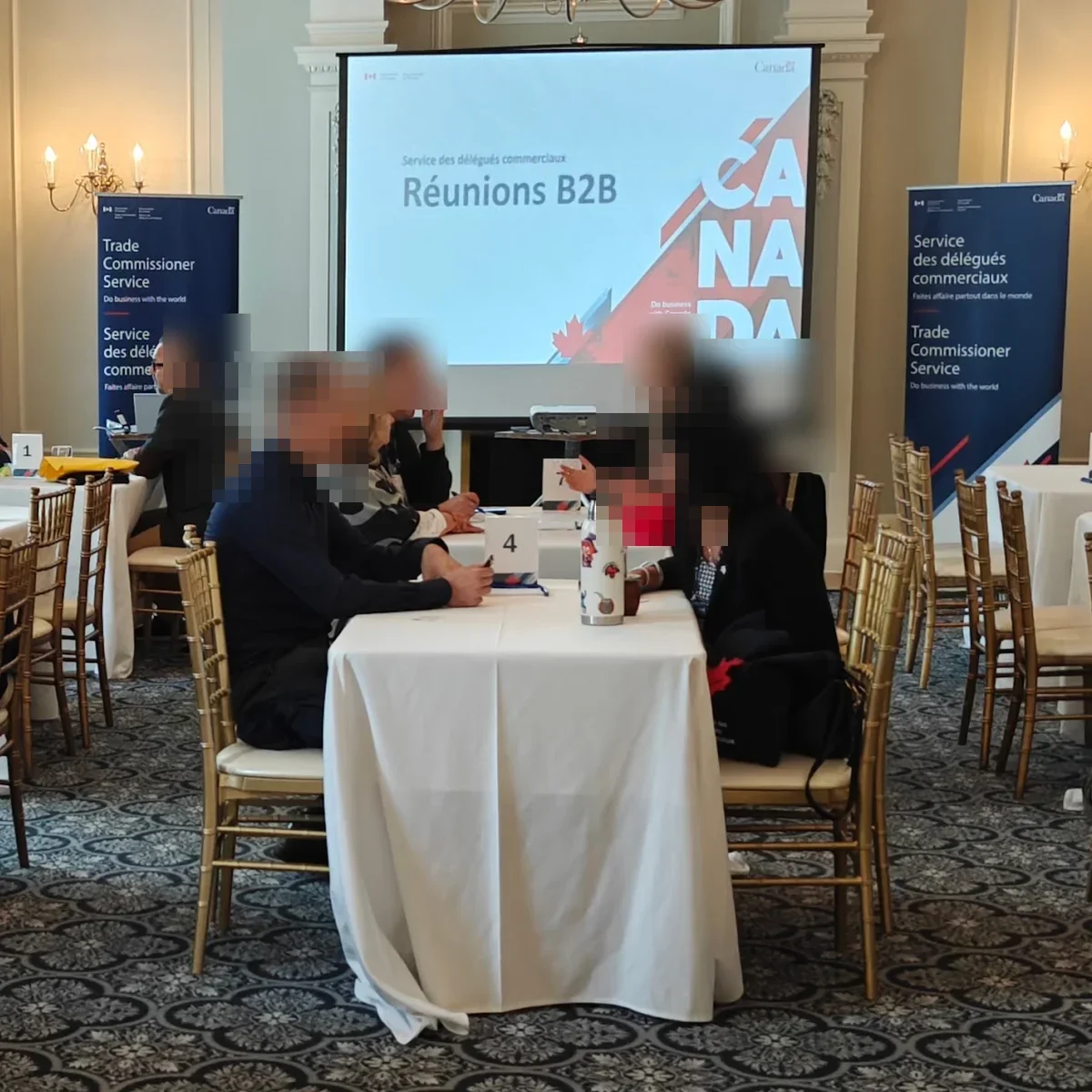 B2B matchmaking meetings at numbered tables at a Government of Canada Trade Commissioner Service event run on Moostoo
