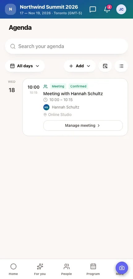 The attendee app's agenda showing a confirmed meeting with its table
