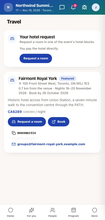The attendee app's Travel screen with a Request a room button on a hotel card