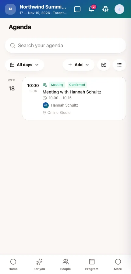 The attendee app's agenda showing a confirmed meeting with its table